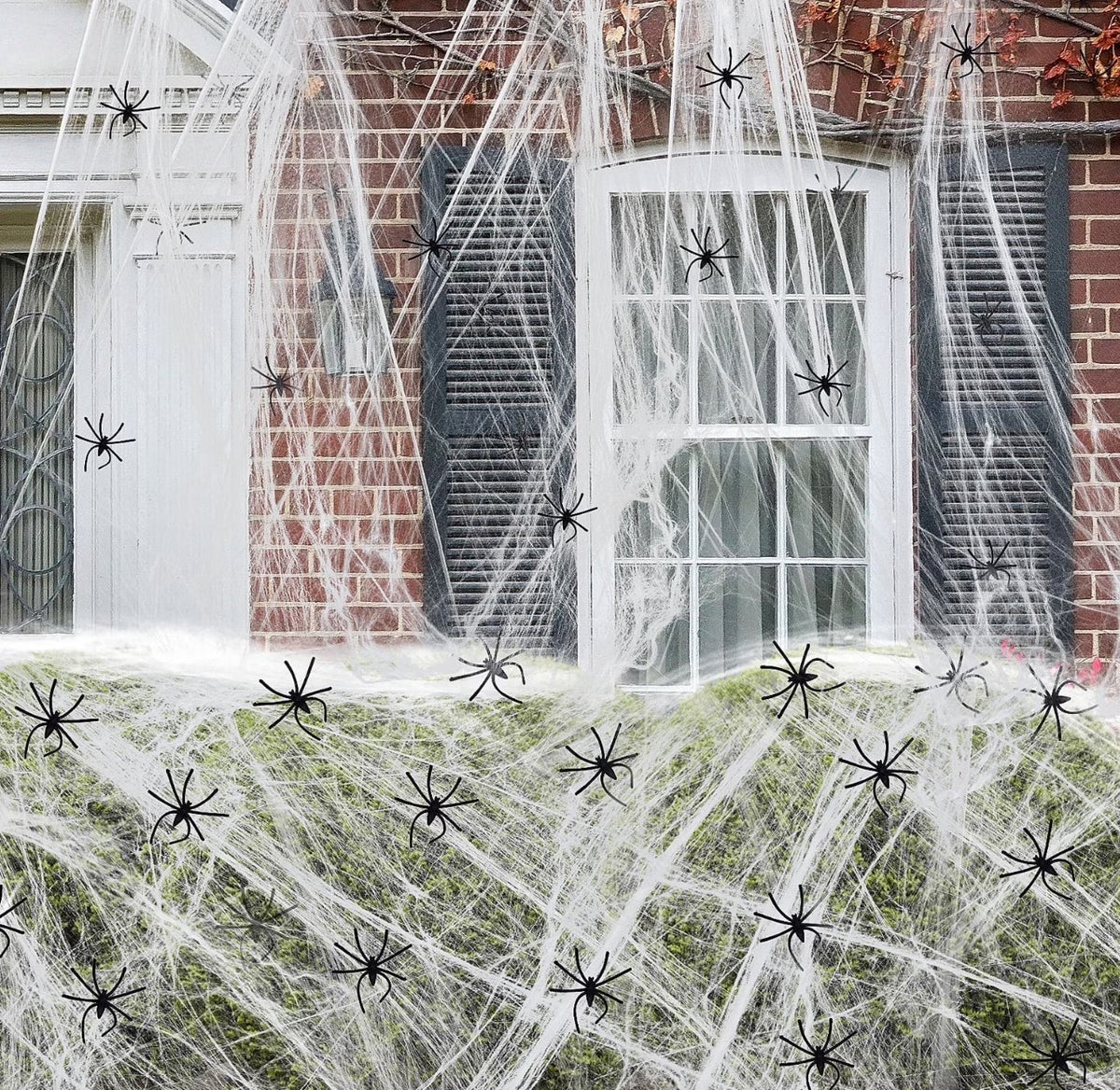 Halloween Decor: 1400 SQ FT Spider Web with 100 Fake Spiders