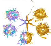 String lights in gold and multicolor on a white background