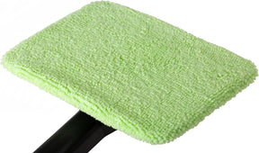 The microfiber cleaning pad is rectangular, featuring a soft, plush surface in bright green, designed for efficient cleaning. The pad is attached to a sturdy black handle, emphasizing its functionality.