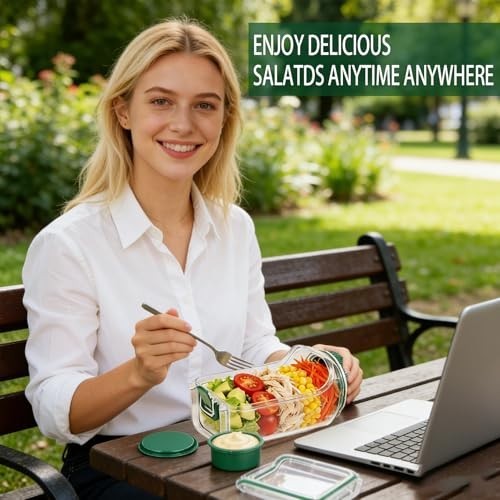 A woman is sitting on a park bench, smiling while holding a fork with a salad filled mason jar in front of her, alongside a small container of dressing and a laptop. The background features green foliage and a sunny day.