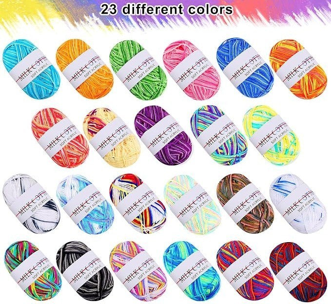 A vibrant assortment of 23 acrylic yarn skeins displayed in various colors, including shades of blue, green, orange, yellow, pink, purple, and more, all featuring a white label. Each skein is rounded and neatly arranged, showcasing the diverse palette available.