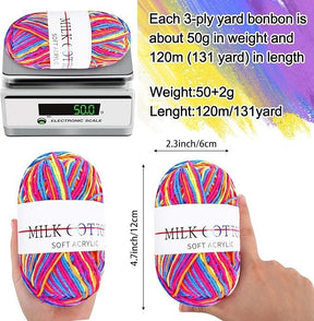 A colorful skein of soft acrylic yarn is shown being held in a hand, displaying its dimensions of approximately 4.7 inches in height and 2.3 inches in width. An electronic scale next to the yarn shows a weight of 50 grams, with additional text providing details on length and material.