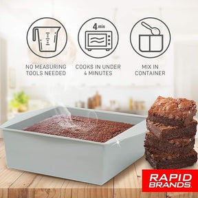 Square, gray microwave brownie maker displaying warm, freshly baked brownies with steam rising from the surface, accompanied by stacked brownies on the side.