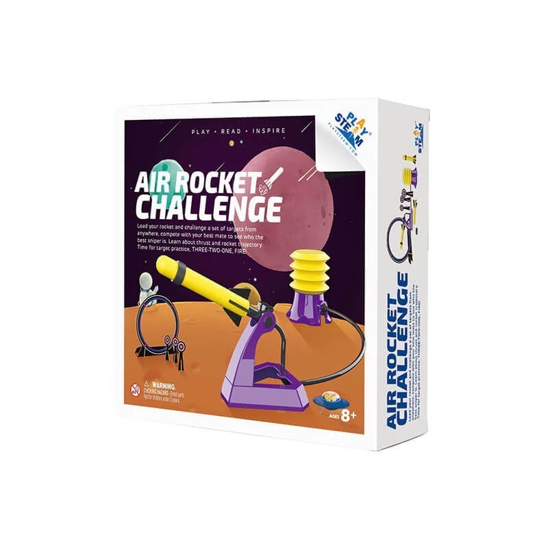 The box features a colorful design with the title "AIR ROCKET CHALLENGE" prominently displayed. It showcases a yellow rocket launcher attached to a purple base, along with a set of target rings and a yellow air pump.