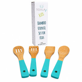 Set of four bamboo utensils with turquoise handles, including a slotted spatula, solid spatula, and two different spoons, displayed alongside a tall, colorful packaging box labeled for kids.