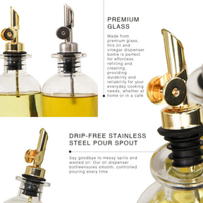 Close-up view highlighting two glass oil and vinegar dispensers, featuring a gold and a silver stainless steel pour spout, with visible liquid inside. The dispensers are designed for easy refilling and cleaning, showcasing a modern and minimalist aesthetic.