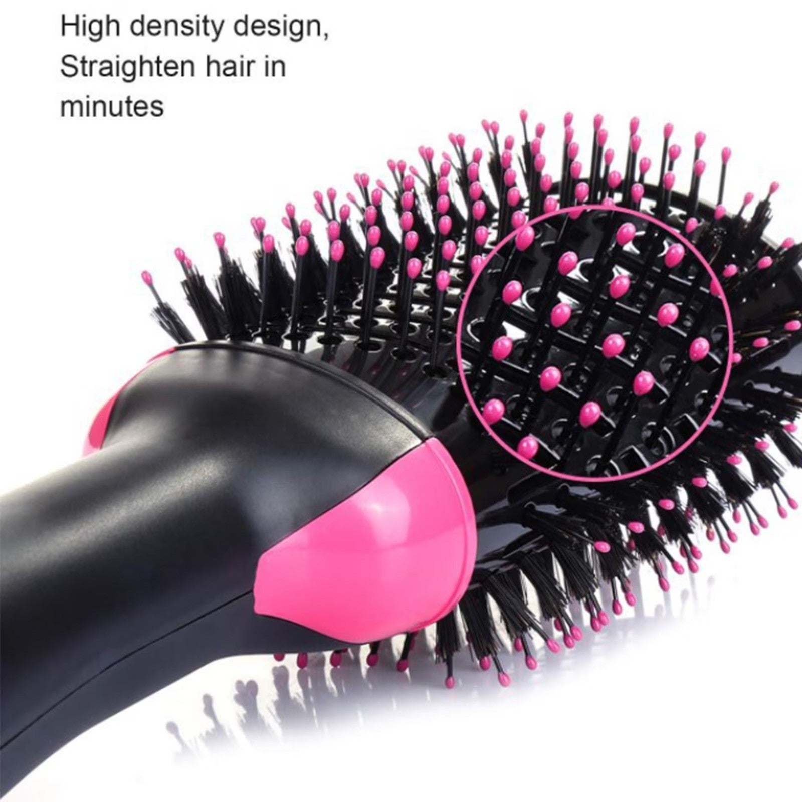 Close-up of the 3 In 1 Hot Air Brush showing its high-density bristles in black with pink tips, designed for efficient straightening, along with the ergonomic black handle featuring pink accents.
