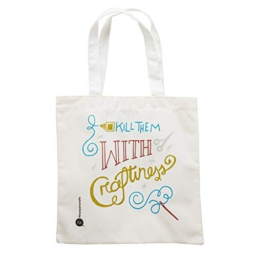 Canvas tote bag featuring colorful text that reads "KILL THEM WITH CREATIVENESS," complemented by whimsical illustrations of scissors and knitting supplies. The bag has sturdy handles for easy carrying.