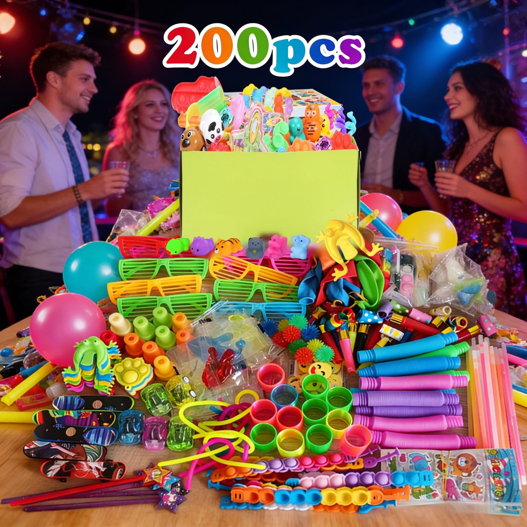 A vibrant assortment of small toys, including colorful balls, clips, and novelty items, is displayed alongside a bright green box, all set on a table at a lively party. In the background, people enjoy the festive atmosphere with drinks in hand.