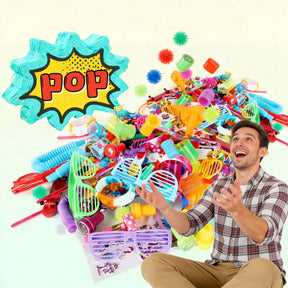 A variety of colorful small toys are scattered around a man sitting on the floor, joyfully catching some of the toys as they fall, with a "POP" graphic in the background.