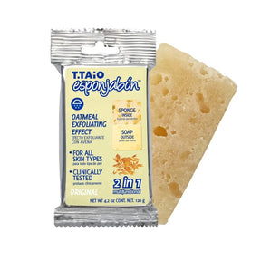 Close-up view of the T.Taio Esponjabon, showing the yellowish bar soap that features a textured surface, alongside its packaging that highlights its oatmeal exfoliating effect and 2-in-1 functionality.