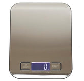 Sleek stainless steel digital food scale with a smooth surface, showing a digital display reading "0 g" and two control buttons at the bottom.