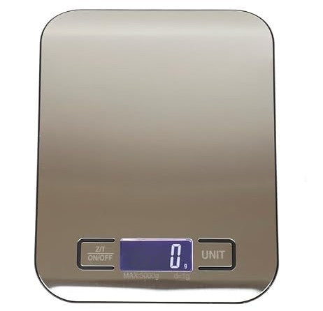 Sleek stainless steel digital food scale with a smooth surface, showing a digital display reading "0 g" and two control buttons at the bottom.