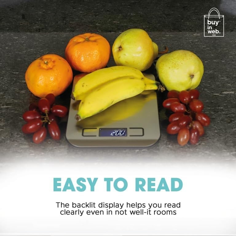 The digital food scale is displayed on a countertop with bananas, oranges, green pears, and red grapes arranged around it. The scale features a backlit display for easy reading, indicating a weight of 201 grams.
