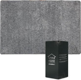 The gray doormat features a textured surface and rounded corners, measuring 23 x 35 inches, with a black box displaying the brand name "Linka Home" and product details in the bottom corner.