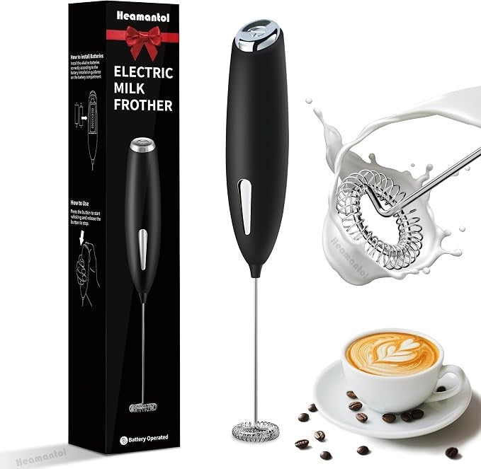 Electric milk blender with a sleek black handle, a chrome accent, and a whisk attachment, shown alongside its packaging and a coffee cup with latte art.