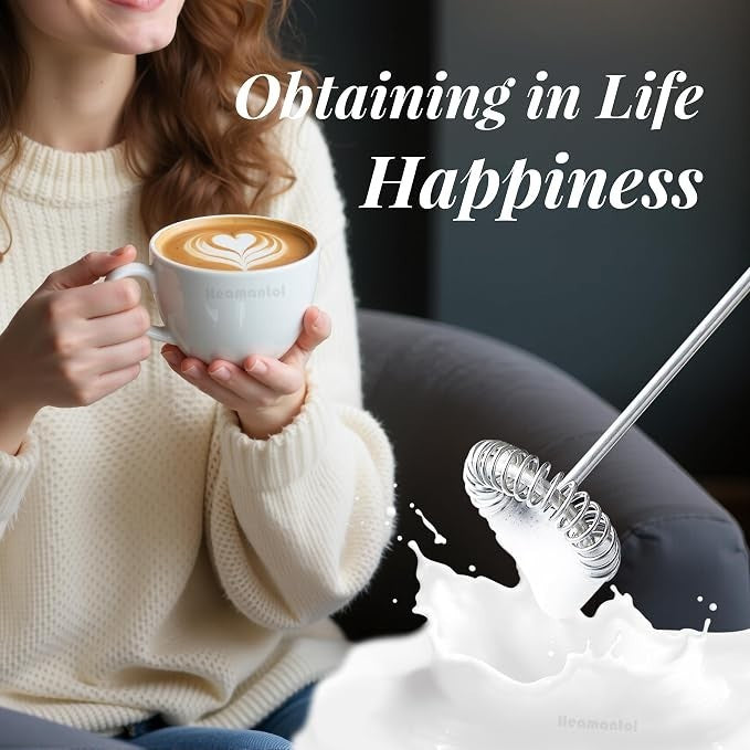 A woman in a cozy sweater holds a cup of latte art with a heart design, while a milk frother is shown to the side, suggesting its use for creating frothy beverages.