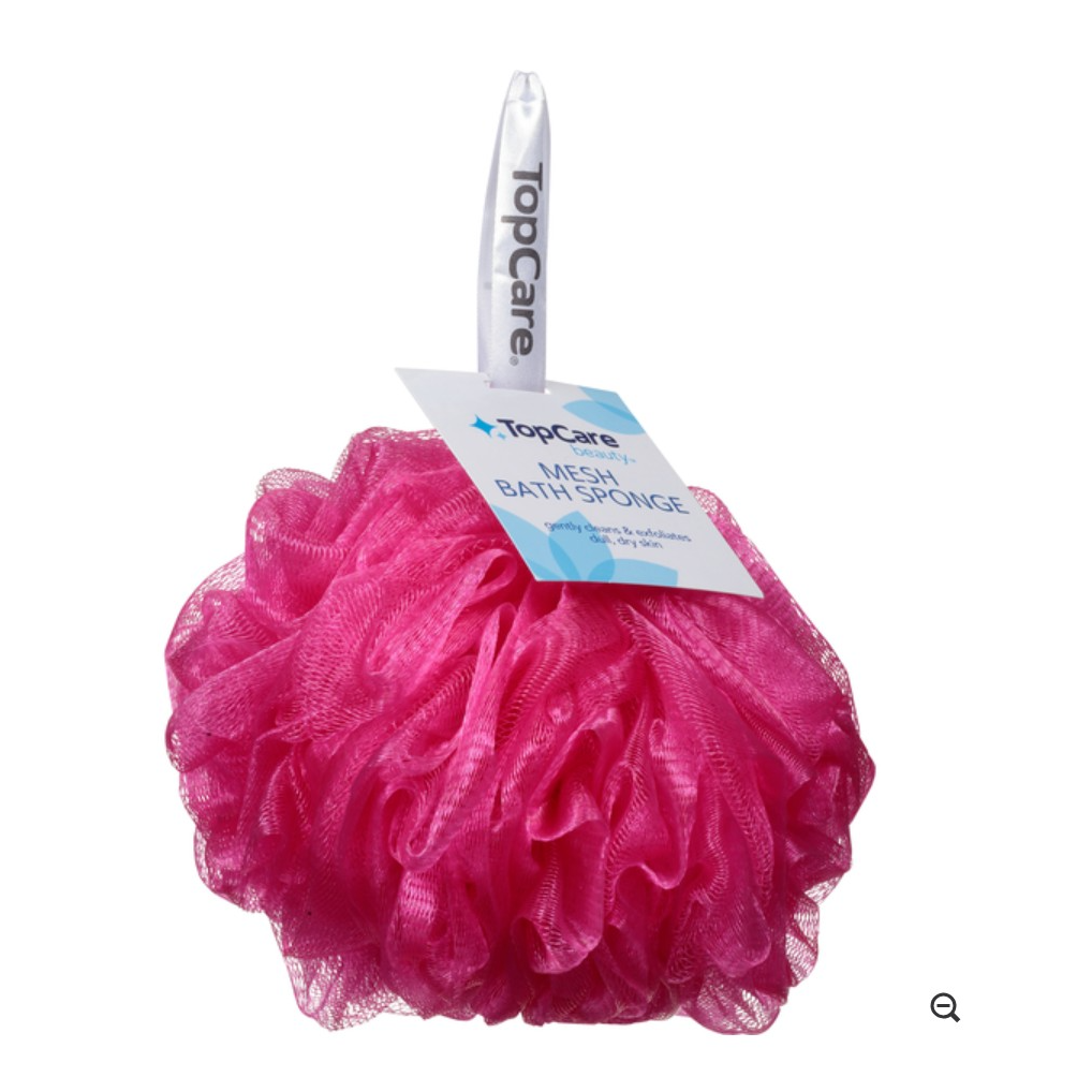 Bright pink mesh bath sponge with a fluffy texture, featuring a label that reads "TopCare MESH BATH SPONGE" attached by a hanging loop.
