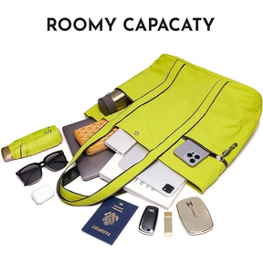 The vibrant lime green tote bag is shown partially open, revealing its spacious interior filled with various items including sunglasses, a laptop, a passport, and a water bottle, showcasing its roomy capacity. The bag features sleek black trim and long handles for easy carrying.