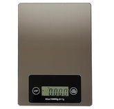 Large stainless steel digital food scale with a sleek surface and an easy-to-read digital display showing a weight measurement.