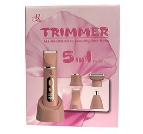 The packaging features a soft pink background with the title "TRIMMER" and a description indicating it's an all-in-one kit for grooming. The kit displays a cordless trimmer in a matching pink color, positioned in a stand, along with four interchangeable heads arranged alongside it.