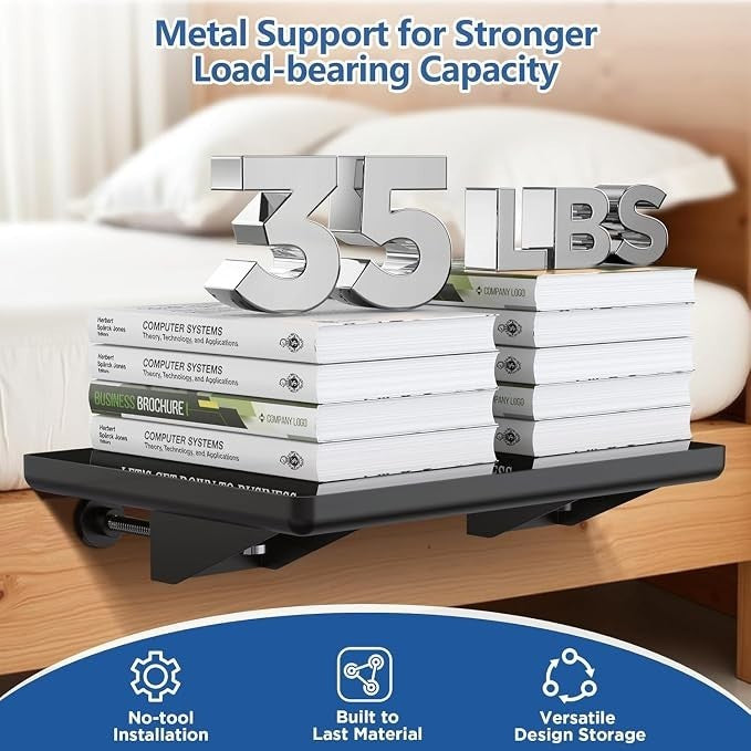 A black floating nightstand with a sturdy design displaying the number "35 LBS" emphasizes its load-bearing capacity, supporting several stacked books. The shelf is shown attached to the side of a bed, highlighting its practical use in a bedroom setting.