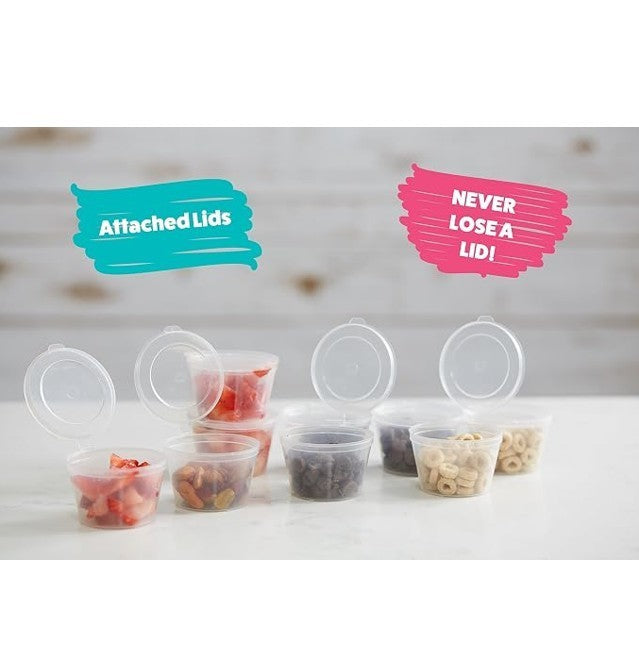 Several clear plastic containers with attached lids are filled with colorful snacks like fruits, nuts, and cereals, arranged on a countertop. Text highlights include "Attached Lids" and "NEVER LOSE A LID!" in vibrant colors.