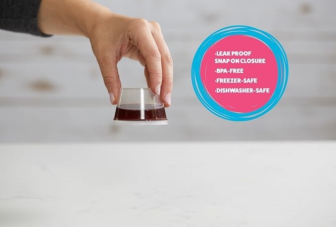 A hand holding a clear, 3 oz. container with a dark liquid inside, demonstrating its leak-proof snap-on closure. Text on the side highlights features such as being BPA-free and safe for freezer and dishwasher use.