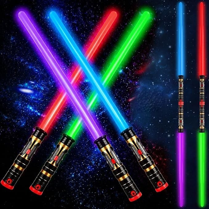 Four light-up swords in vibrant colors of red, green, blue, and purple, each featuring a black handle with gold accents and a red button, are arranged in an overlapping pattern against a cosmic background.