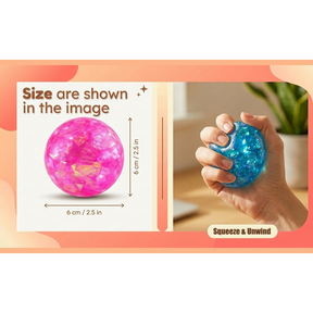 A bright pink glitter stress ball is shown alongside a hand squeezing a blue glitter stress ball, demonstrating their 2.5-inch size. The background features a soft, cozy indoor setting with a glimpse of greenery.
