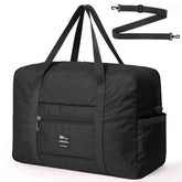 Stylish black foldable tote bag with dual handles, featuring a front zip pocket and a removable shoulder strap. Ideal for travel, it combines practicality with a sleek design.