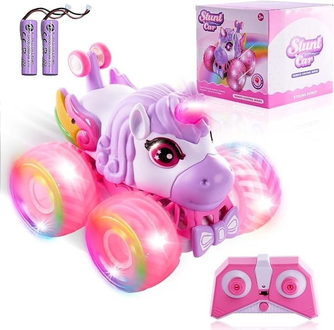 Colorful unicorn monster truck with large pink wheels that light up, featuring a friendly unicorn face and a bow tie, alongside a remote control and a pink box.
