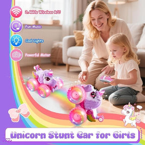 Two colorful unicorn monster trucks with vibrant LED wheels are shown in action, as a smiling mother and daughter play together on a living room floor, with the child holding a remote control. The scene is bright and cheerful, reflecting a fun interactive moment.