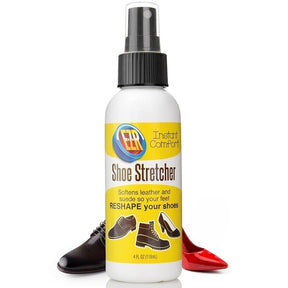 Shoe stretch spray bottle with a white body and black spray cap, featuring a yellow label that reads "EZR Shoe Stretcher" and images of shoes; placed between a black leather shoe and a red high heel.