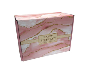 The gift box features a marbled pink design with gold accents and a label that reads "HAPPY BIRTHDAY!" along with a message wishing happiness on the recipient's special day.