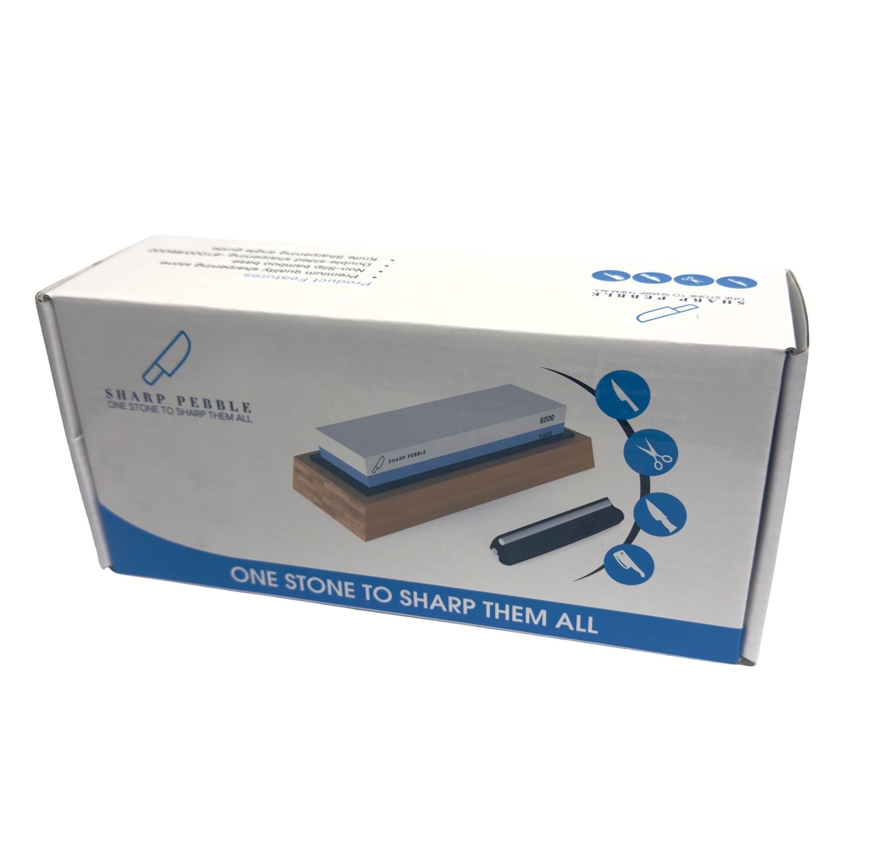 The packaging features the Sharp Pebble logo and the text "ONE STONE TO SHARP THEM ALL" along with images of knives and scissors, showcasing the knife sharpener on a wooden base and the whetstone in gray and white colors labeled with "1000" and "6000" grit.