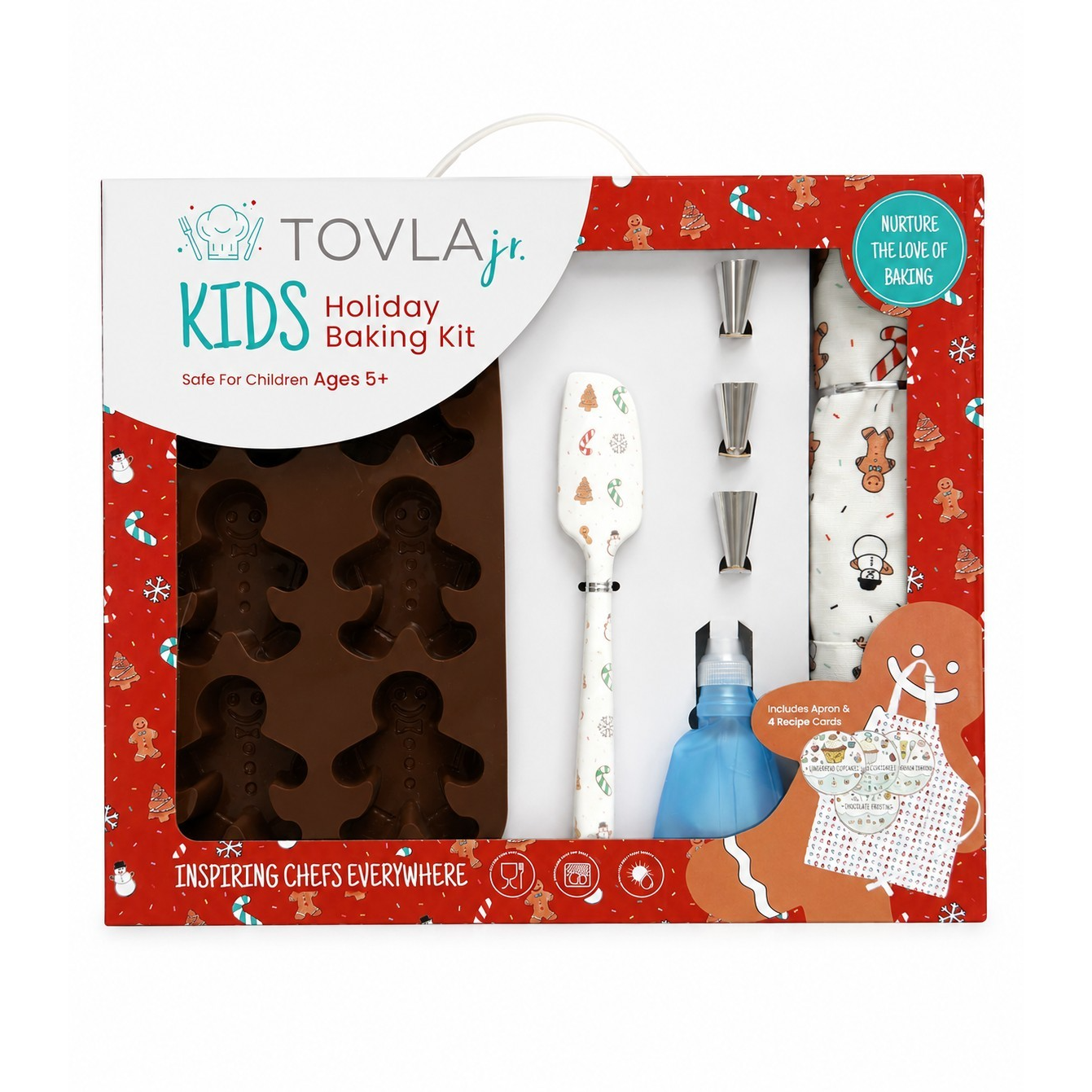 The baking kit features a holiday-themed box in red with festive illustrations and includes a silicone gingerbread cookie mold, a spatula, piping tools, a squeeze bottle, and a printed apron with gingerbread designs. The kit is designed for children ages 5 and up and promotes creative baking during the holiday season.