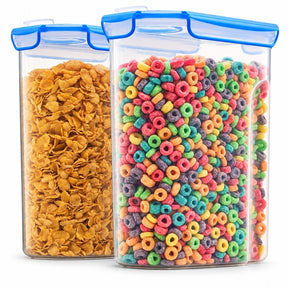 Two clear plastic containers with blue lids, one filled with golden cornflakes and the other with colorful, ring-shaped cereal pieces in various shades.