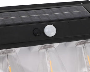 Top view of the solar motion sensor outdoor light showcasing the solar panel, motion sensor, and control button in a sleek black design, with lightbulb openings visible below.