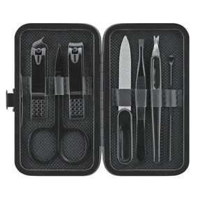 The compact black manicure set features eight grooming tools stored in a sleek case, including scissors, nail clippers, a file, and tweezers, all neatly organized for easy access.