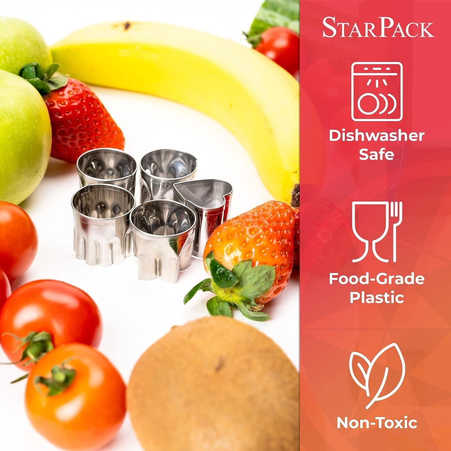 Stainless steel sandwich cutters in various shapes are arranged among colorful fruits and vegetables, including apples, strawberries, tomatoes, and a banana, set against a white background.