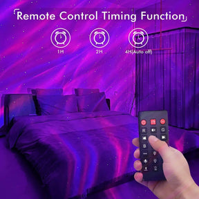 A hand holding a remote control is shown in a dimly lit bedroom, featuring a bed with a dark purple blanket, while colorful star and wave projections illuminate the walls and ceiling in shades of purple and blue.