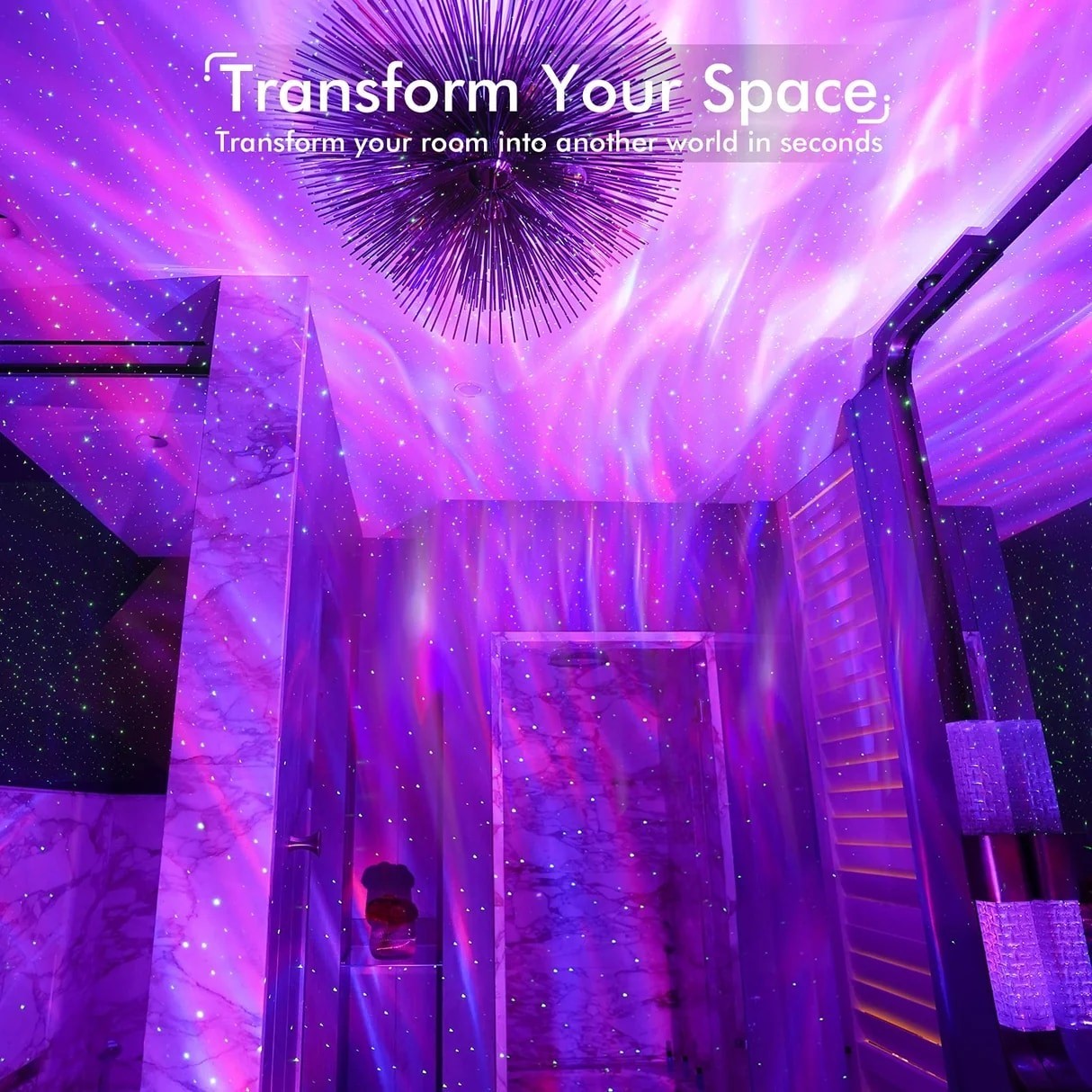 Vibrant purple and pink light patterns projected onto a ceiling and walls, creating a dreamy, cosmic atmosphere, with star-like dots scattered throughout. A modern lighting fixture is visible above, enhancing the decor of the space.
