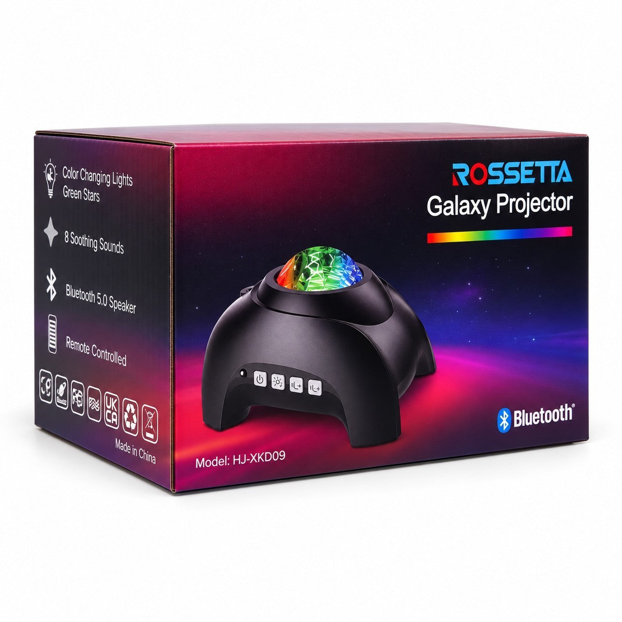 The product packaging features a black box with a colorful design, prominently displaying the Rossetta Galaxy Projector on the top. The projector's dome showcases a vibrant pattern of colors, while the front of the box includes buttons for operation and icons depicting features such as Bluetooth connectivity and soothing sounds.